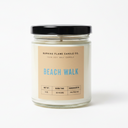 Candle jar labeled 'Beach Walk' by Burning Flame Candle Co. 